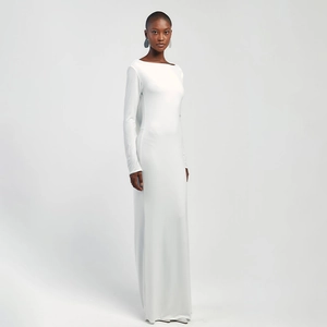 Elegant slim-fit long-sleeved white maxi dress with boat neck and minimalist design