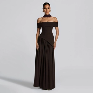 Detail of dark brown strapless floor-length dress with pleated skirt and matching neck strap