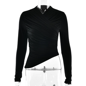 Slim fit black V-neck wrap top with long sleeves, featuring ruched texture and asymmetric hem