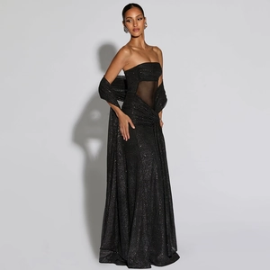 Robe de soirée bustier noire avec paillettes argentées et découpe en mesh à la taille