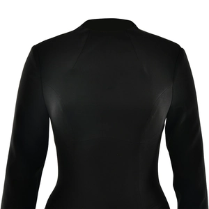 Detail of slim fit black mini dress featuring a round neckline and structured stitching