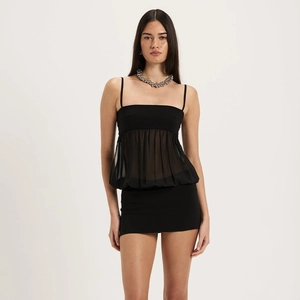 Chic black two-piece set featuring a sheer mesh camisole and a fitted mini bodycon skirt