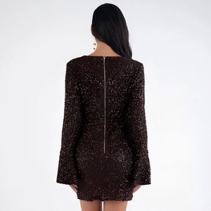 Sparkly sequin mini dress with bell sleeves and back zipper closure for a slim fit look