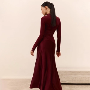 Elegant burgundy high neck long sleeve dress featuring matte bodice and satin maxi skirt