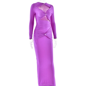 Detail of purple long sleeve slim dress featuring cut-out knot design and silver diamantes
