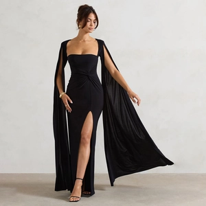 Elegant black long-sleeve maxi dress with cape sleeves, square neck, and high side slit