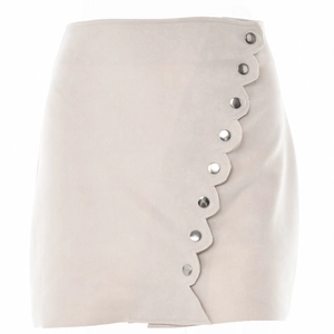 Elegant beige suede mini skirt featuring a scalloped edge and silver button detailing.