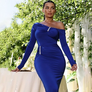 Detail of royal blue one-shoulder dress with elegant draping and rhinestone trim