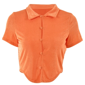 Retro bright orange short sleeve crop top with polo collar and button-down front