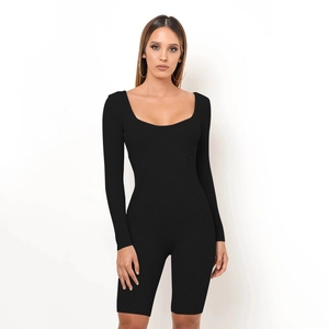 Close-up of black ribbed long sleeve unitard showing high-quality fabric texture