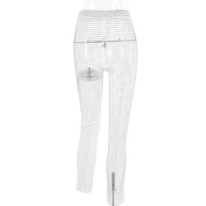 Detail of high-waist white mesh pants with shimmering silver rhinestone embellishments