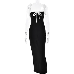Elegant black bodycon maxi dress with white trim and bow tie shoulder straps