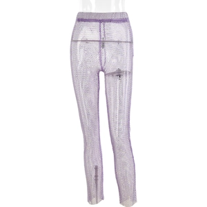 Macro shot of purple mesh trousers with sparkling rhinestones and elastic waist