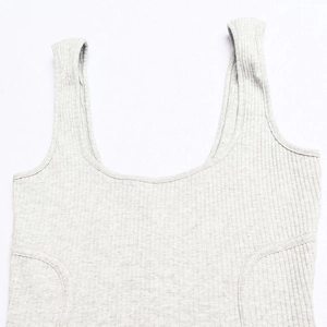 Detail shot of light grey ribbed knit cotton fabric featuring U-neckline and vertical texture