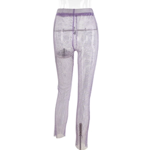 Detail of purple mesh pants with sparkling rhinestones on high-waist see-through fabric