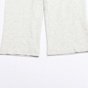 Detailed view of light gray ribbed cotton fabric showing the premium soft knit texture