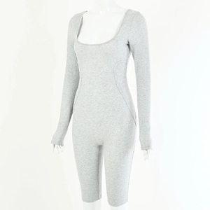 Detail of grey ribbed knit texture on a long sleeve scoop neck slim fit bodysuit