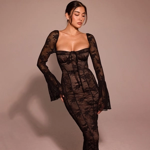 Detail of elegant black lace dress featuring flared sleeves and a chic square neckline