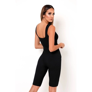 Back view of a black ribbed knit sleeveless romper with a deep U-neck open back design