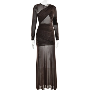Detailed macro view of brown ruched mesh fabric and crossover neckline on the slim maxi dress
