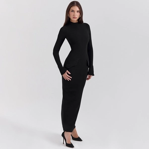 Detailed macro view of black knit long-sleeved midi dress showing side pocket structure