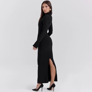 Detail of elegant black bodycon dress featuring high collar and rear split hem design