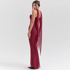 Detail view of wine red ruched maxi dress featuring elegant back mesh streamers