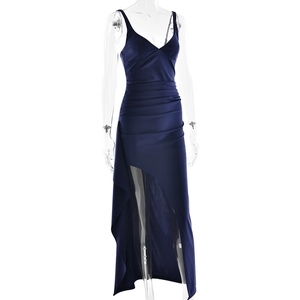 Detail of navy blue satin evening dress showing side slit and waist ruching design