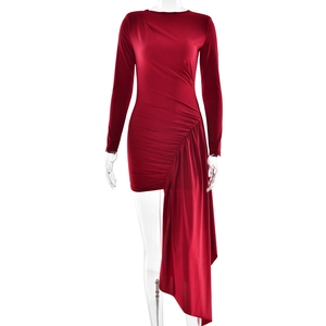 Slim fit long sleeve dress in deep red with elegant side ruching and asymmetrical hemline