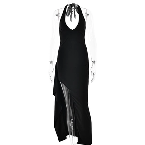 Elegant black halter neck maxi dress with deep V-neck and high side slit ruffle detail