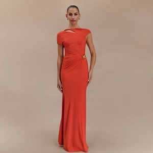 Elegant orange slim fit evening gown with cutout neckline and gold flower waist detail