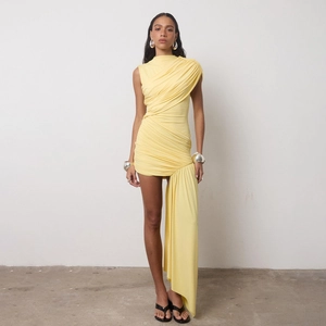 Detail of light yellow sleeveless bodycon dress featuring elegant side drape and ruching