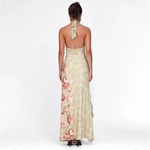 Light green halter neck backless dress with elegant pink floral print and side slit design