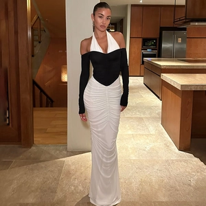 Elegant halter neck bodycon maxi dress in black and white contrast with ruched detail