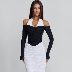 Chic black and white off-shoulder bodycon dress with halter straps and ruched detailing
