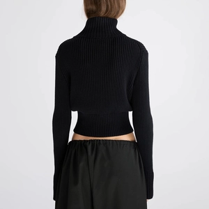 Slim fit black ribbed knit crop top sweater with high neck and long sleeves back view