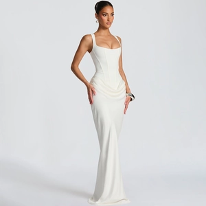 Detail of white corset evening dress showing structured bodice and asymmetrical draping