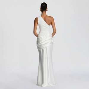 Detail of elegant white one-shoulder satin dress with ruching and fishtail silhouette