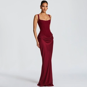 Detail of burgundy evening gown featuring a corset-style square neck and pleated waistline