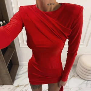 Elegant red long sleeve bodycon mini dress with shoulder pads and ruched detailing
