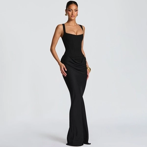 Detailed view of the black mermaid evening gown with waist draping and corset structure