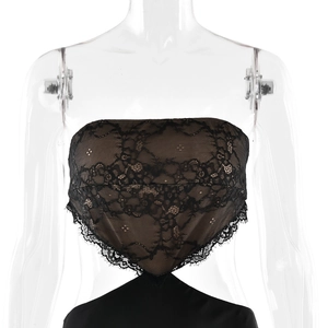 Detail of floral lace bodice featuring intricate cutouts and delicate eyelash trim