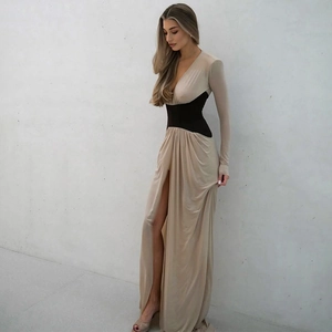 Elegant beige long sleeve V-neck maxi dress with black cinched waist and high side slit