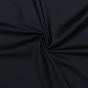 Macro detail of high-quality black textile fabric with smooth texture and subtle glossy finish