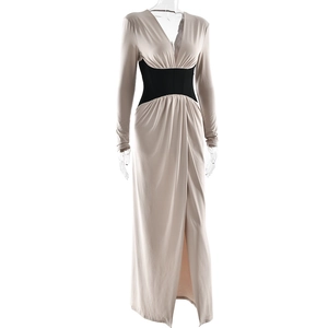 Detail view of plunging V-neck dress with black contrast waistband and front slit