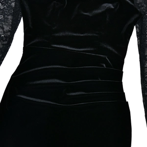 Detail of black velvet dress with pleated waist and sheer lace floral long sleeves