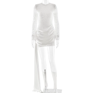 Elegant white lace bodycon dress with long sleeves, ruffles, and flowing side ribbons