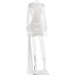 Detail of white floral lace fabric and elegant side ribbon on long sleeve dress