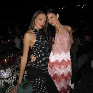 Polka dot halter neck dress and gradient fringe gown shown in outdoor evening setting