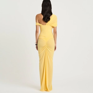 Detail of ruched back design on vibrant yellow one-shoulder bodycon maxi dress
